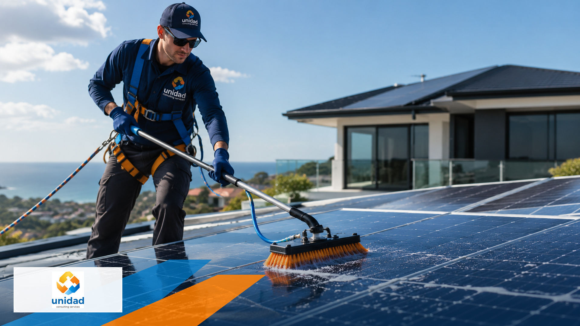 Harnessed technician safely cleaning residential solar panels
